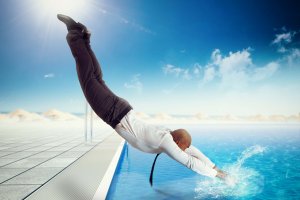 Businessman,Suit,Dives,Into,The,Swimming,Pool Businessman,Suit,Dives,Into,The,Swimming,Pool